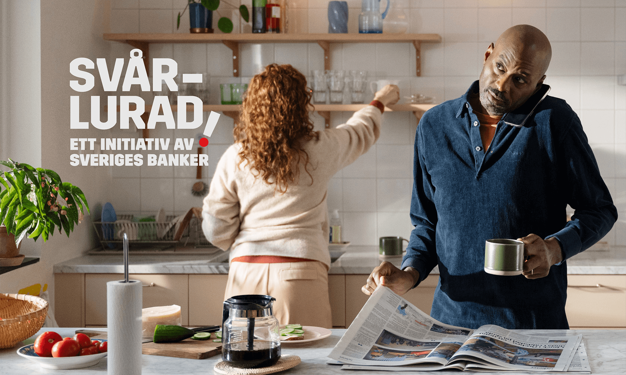 Woman and man standing in kitchen